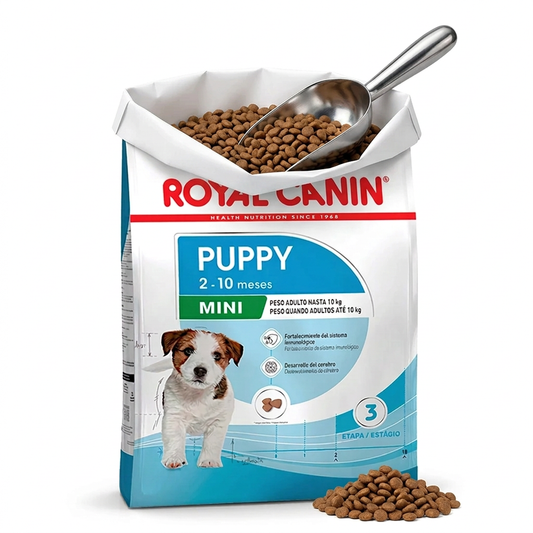 Imagen ilustrativa de Royal Canin Mini Puppy a granel, saco abierto con interior blanco y pala metálica. Venta por kilo.